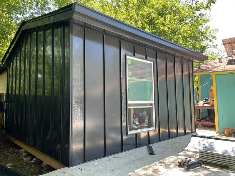 Black standing seam metal wall panels for Roof Inspection in Indiana