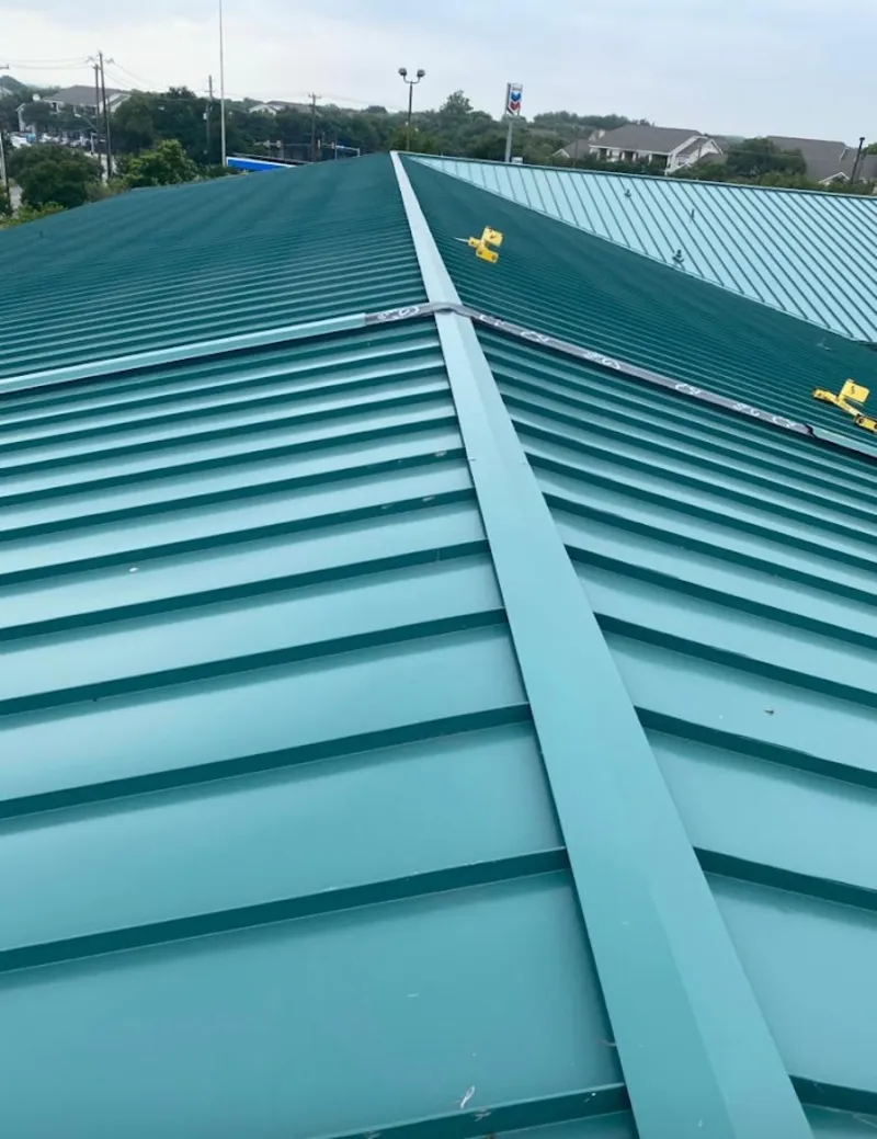 Green commercial metal roof ridge and valley for Metal Roof Repair in Indiana
